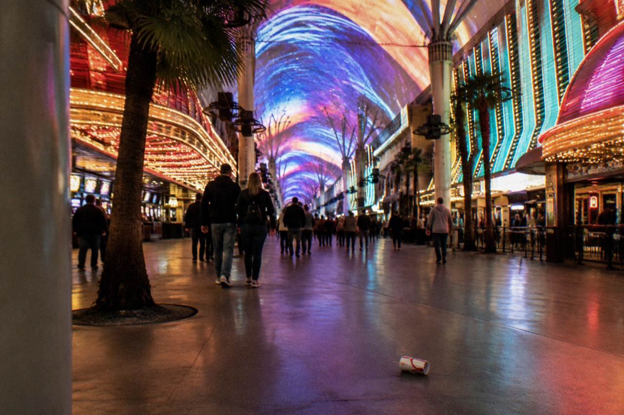 The glowing canopy of lights stretched over a downtown Las Vegas pedestrian street at night
