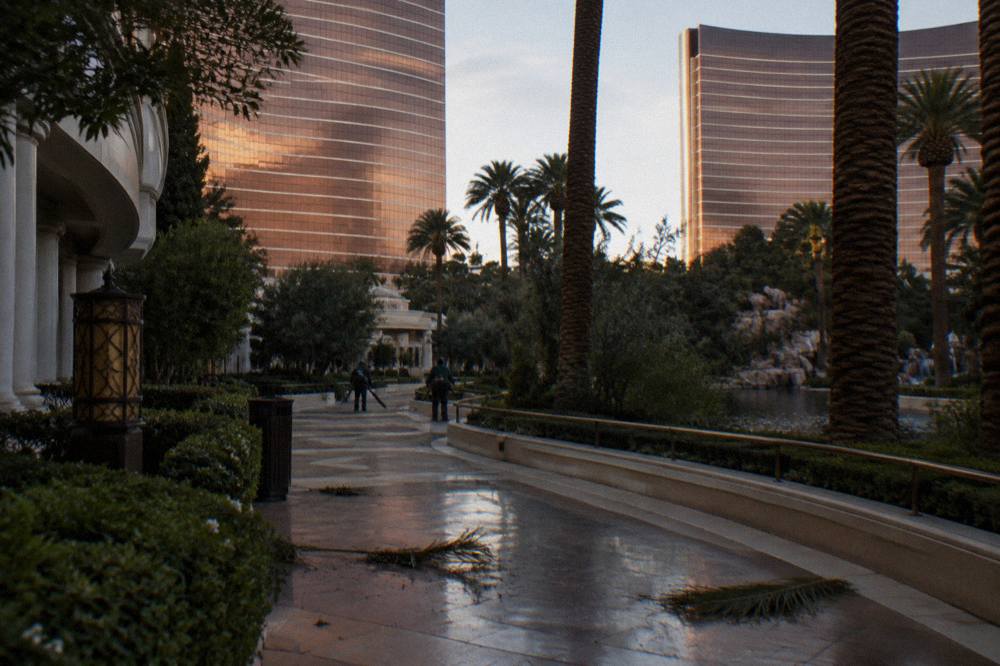 An empty walkway between Las Vegas resort towers in late afternoon light