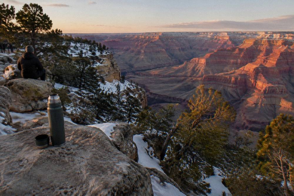 Layered canyon walls glowing red under afternoon winter light