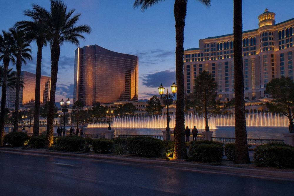 Las Vegas Boulevard resorts reflecting light along the street at night